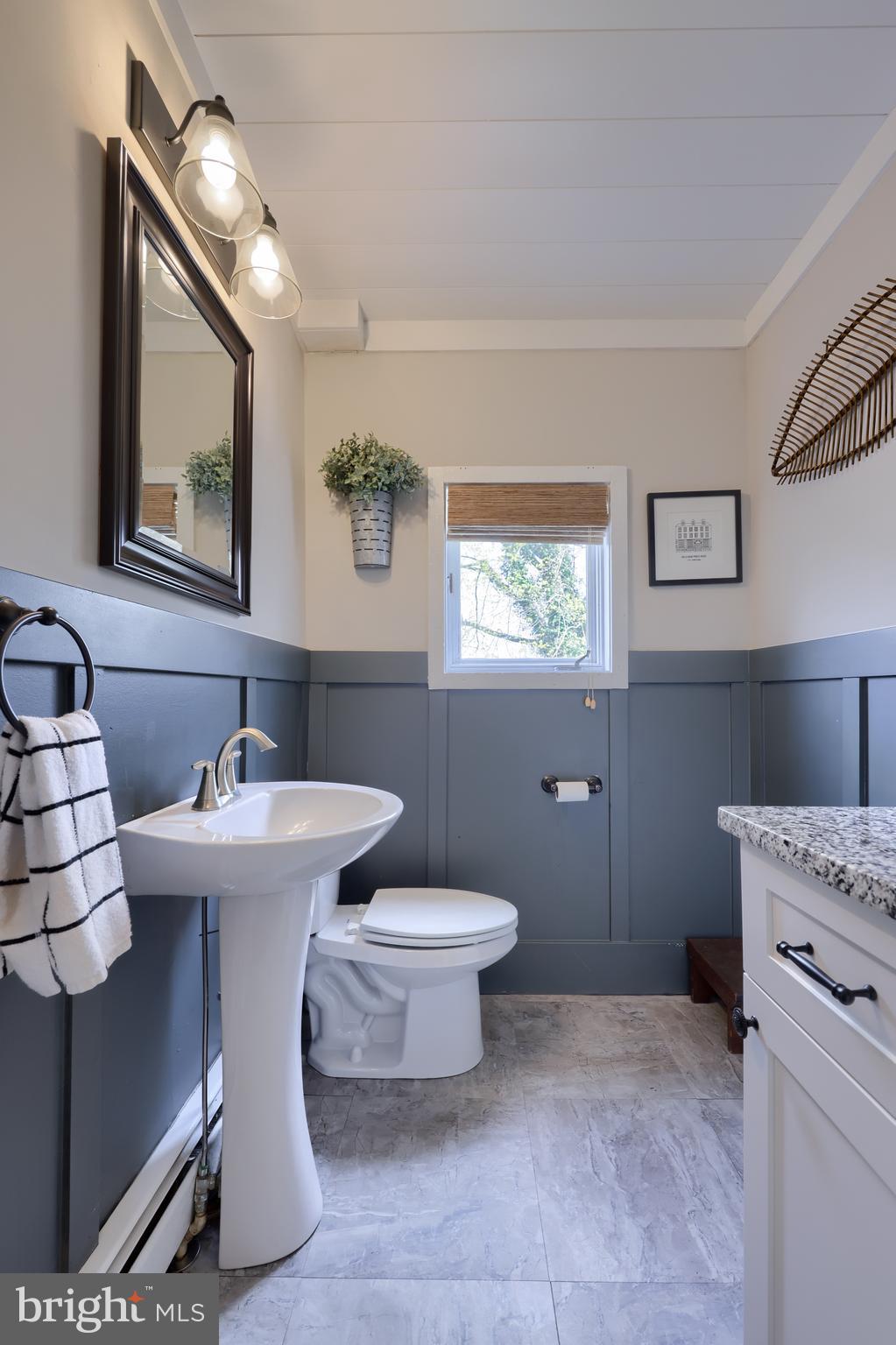 119 South Cedar Street Lititz, PA 17543 - Photo 12 of 22 a bathroom with a sink and a mirror