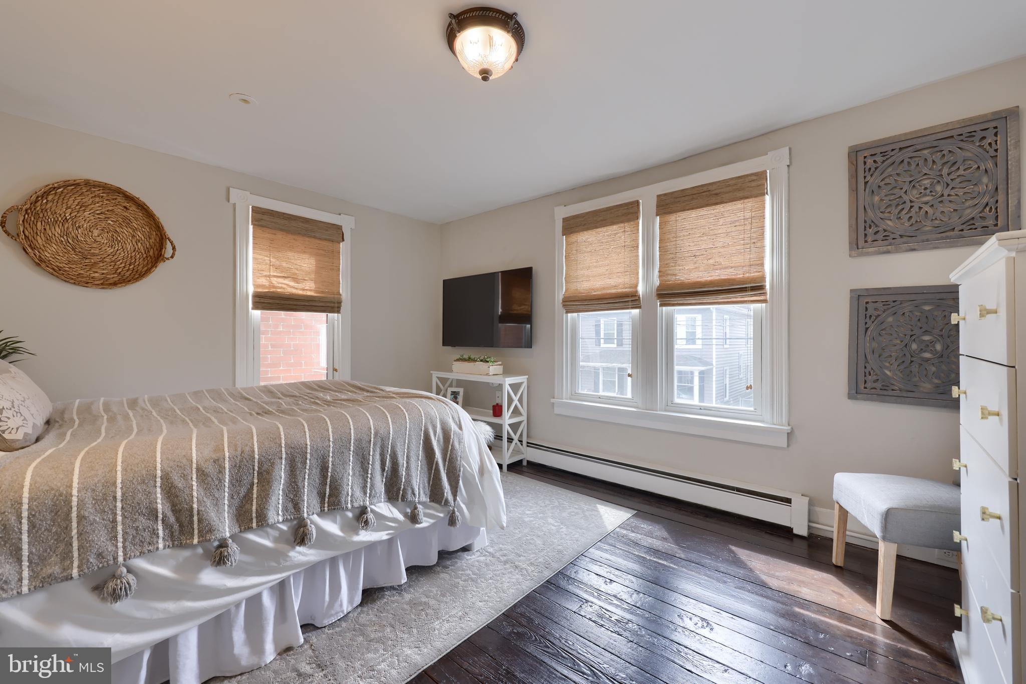 119 South Cedar Street Lititz, PA 17543 - Photo 18 of 22 a bed sitting in a bedroom next to a window