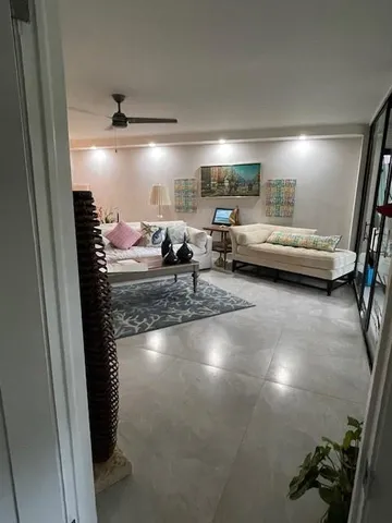 a view of a livingroom with furniture