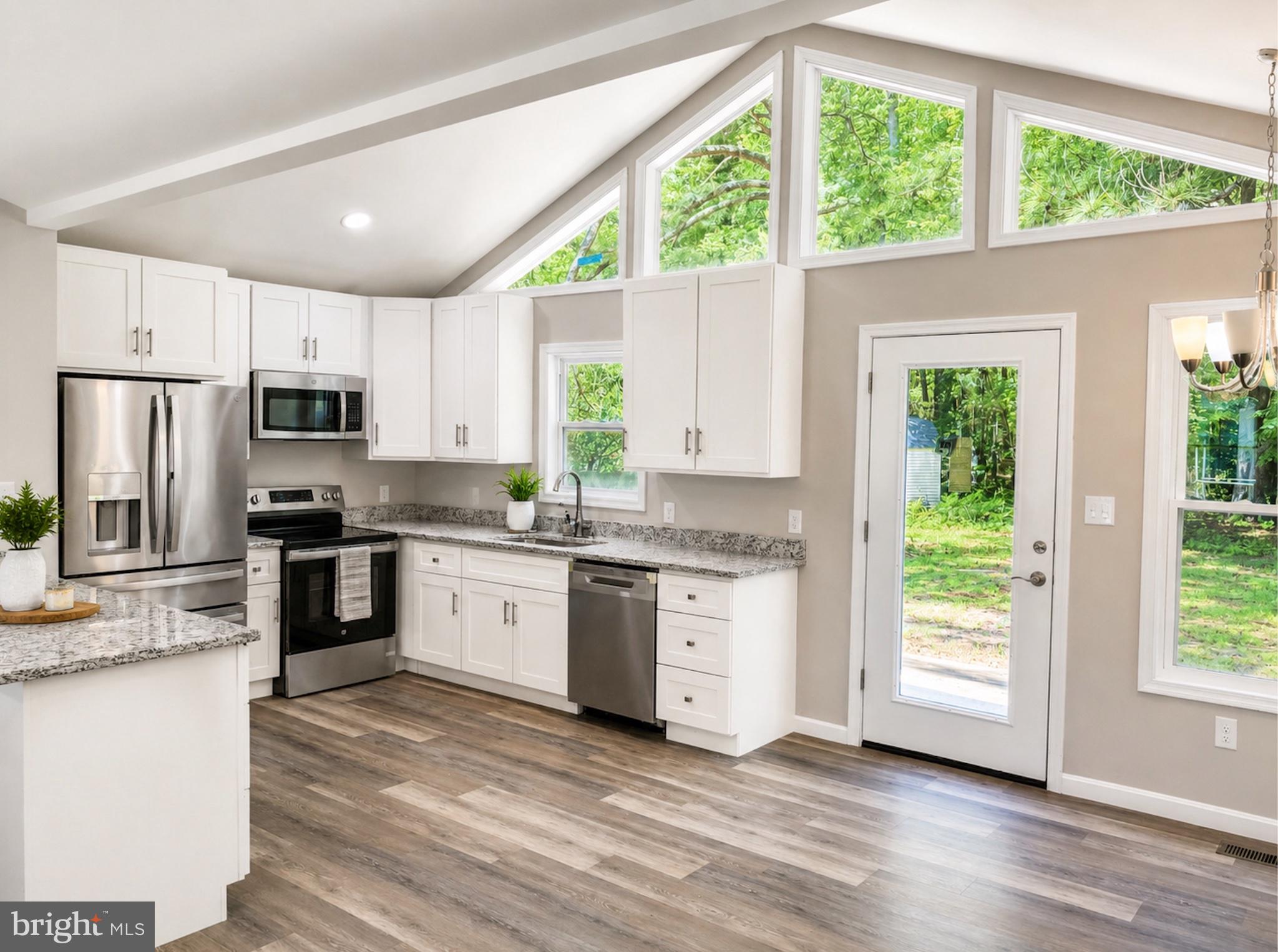 12199 Tower Way Exmore, VA 23350 - Photo 3 of 6 Bright and airy modern kitchen retreat.