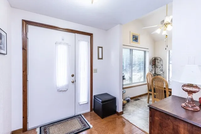 a view of a livingroom with furniture and windows