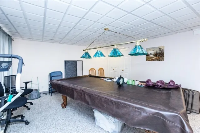 a view of a workspace with furniture