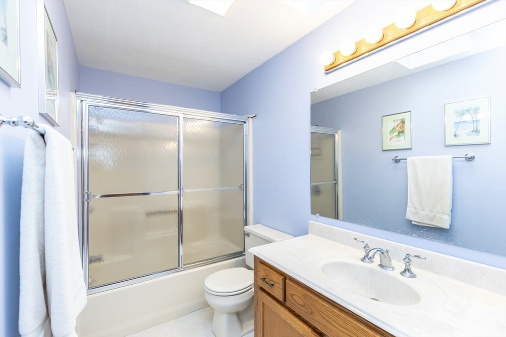 81 Clement Court, Unit 81 Haverhill, MA 01832 - Photo 29 of 36 a bathroom with a sink toilet and shower