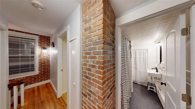 a bathroom with a bathtub and shower