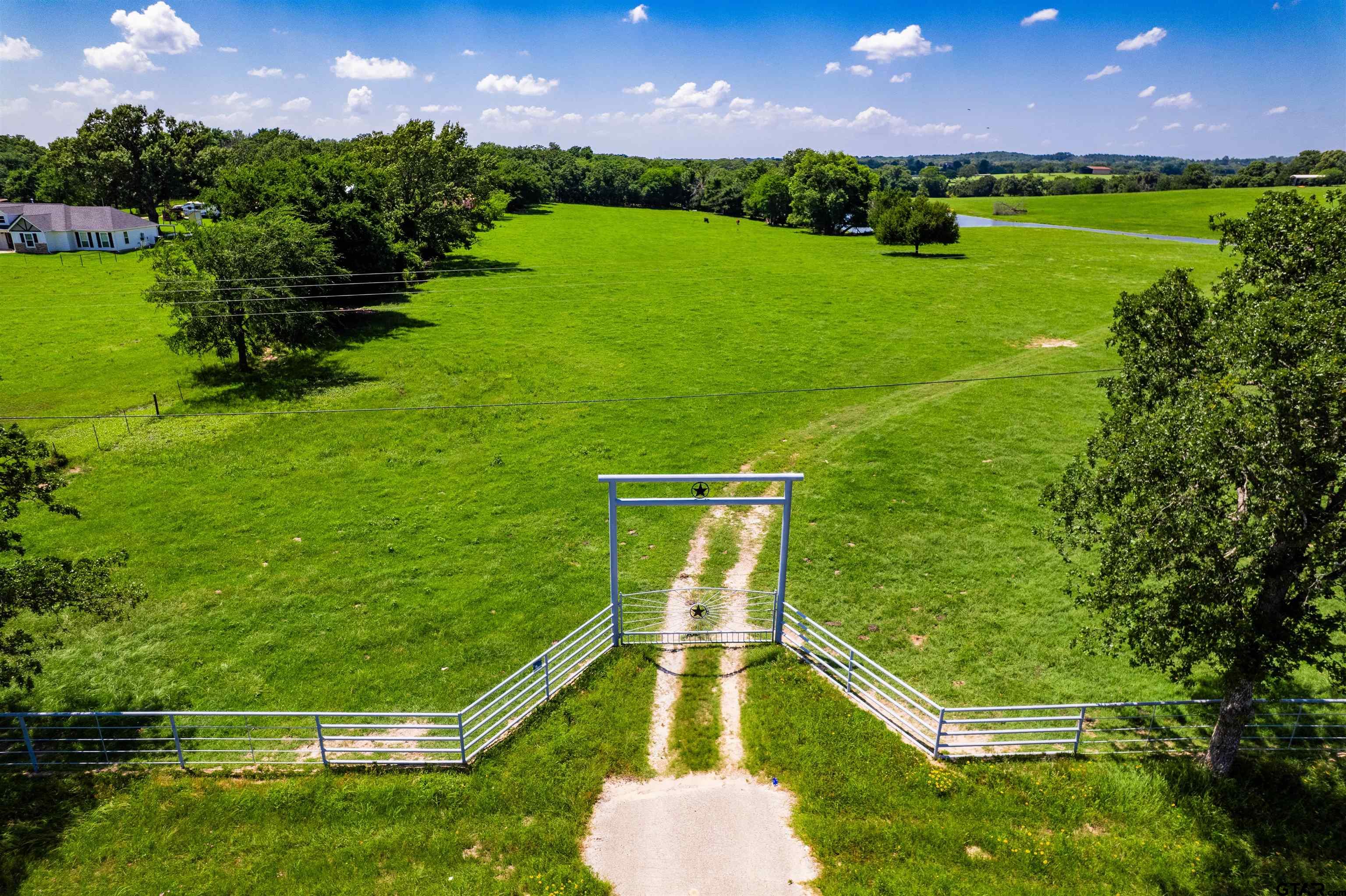 8970 Fm 59 Athens, TX 75751 - Photo 2 of 14 a view of a golf course with a lake