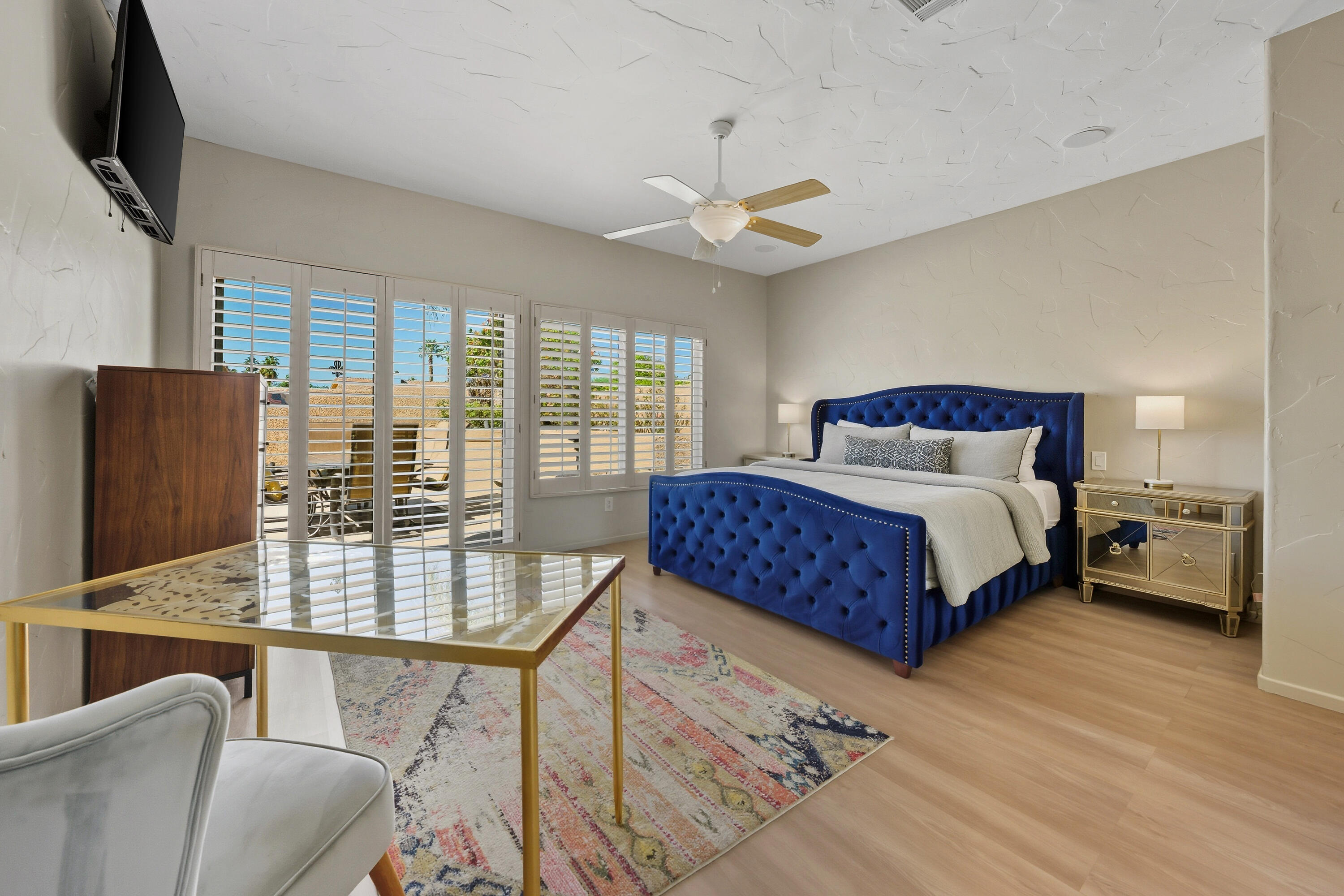 15 Florentina Drive Rancho Mirage, CA 92270 - Photo 15 of 34 a bedroom with a large bed and a couch