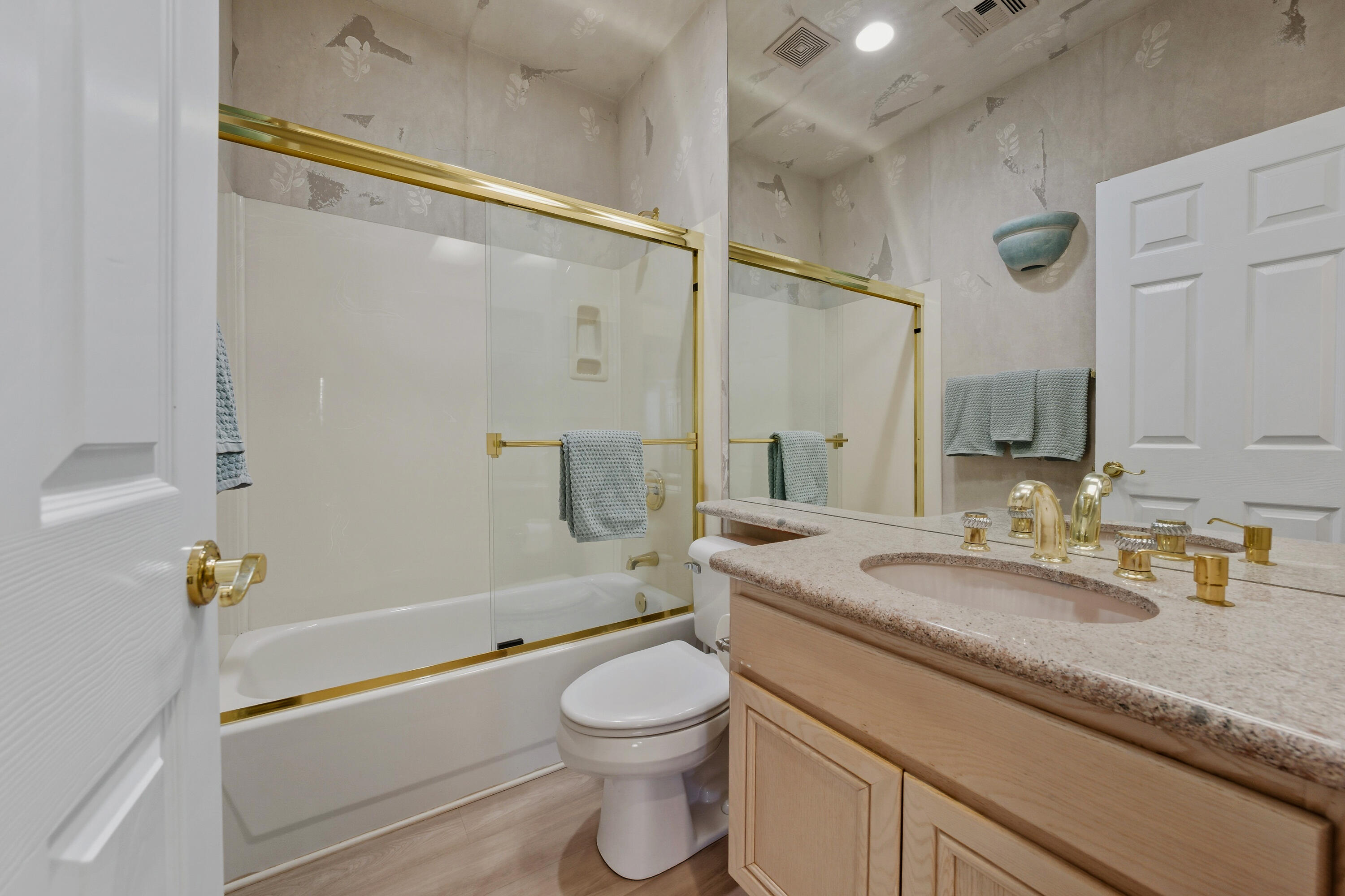 15 Florentina Drive Rancho Mirage, CA 92270 - Photo 20 of 34 a bathroom with a granite countertop sink toilet and shower