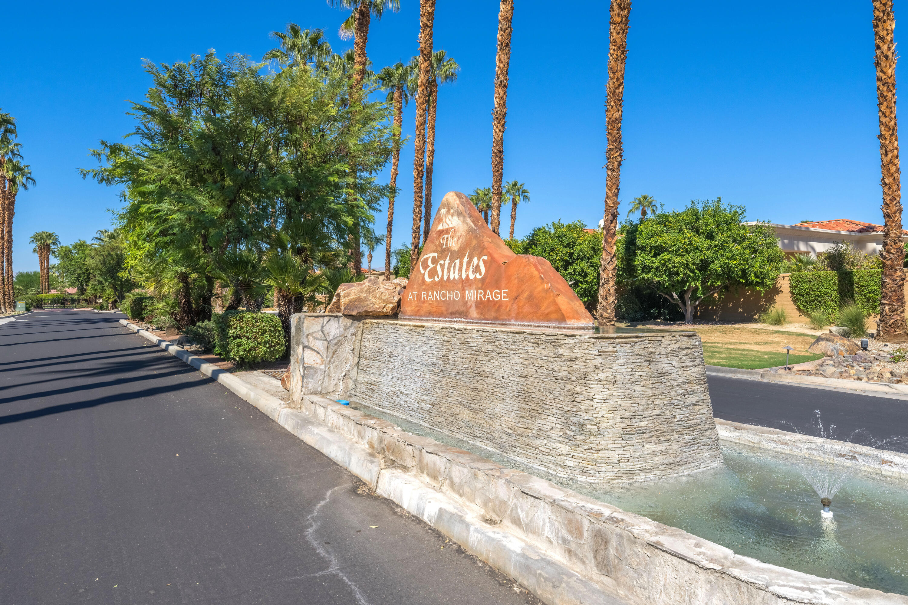 15 Florentina Drive Rancho Mirage, CA 92270 - Photo 28 of 34 a view of a swimming pool with an outdoor space and seating area