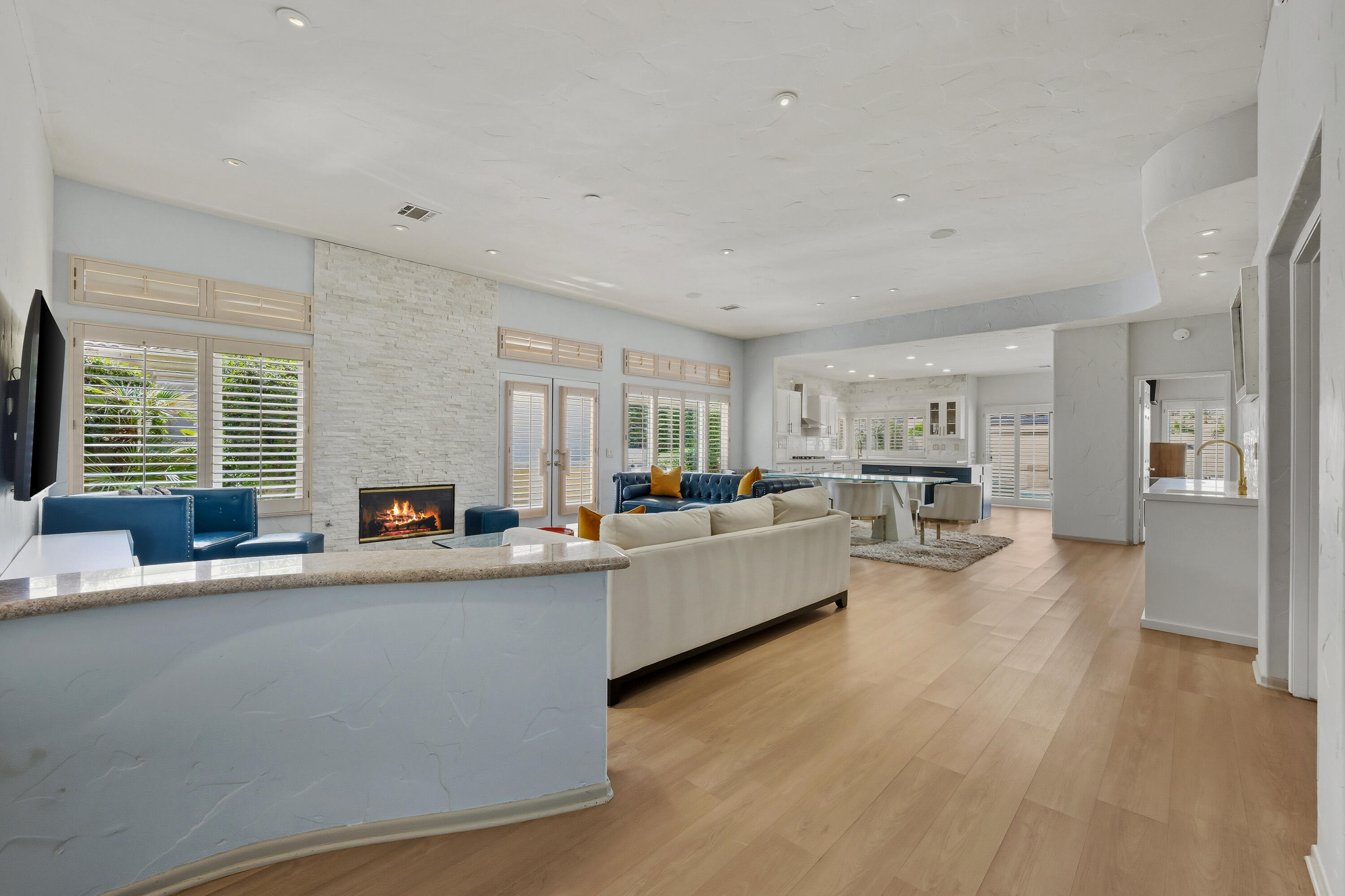 15 Florentina Drive Rancho Mirage, CA 92270 - Photo 7 of 34 a living room with furniture and a large window