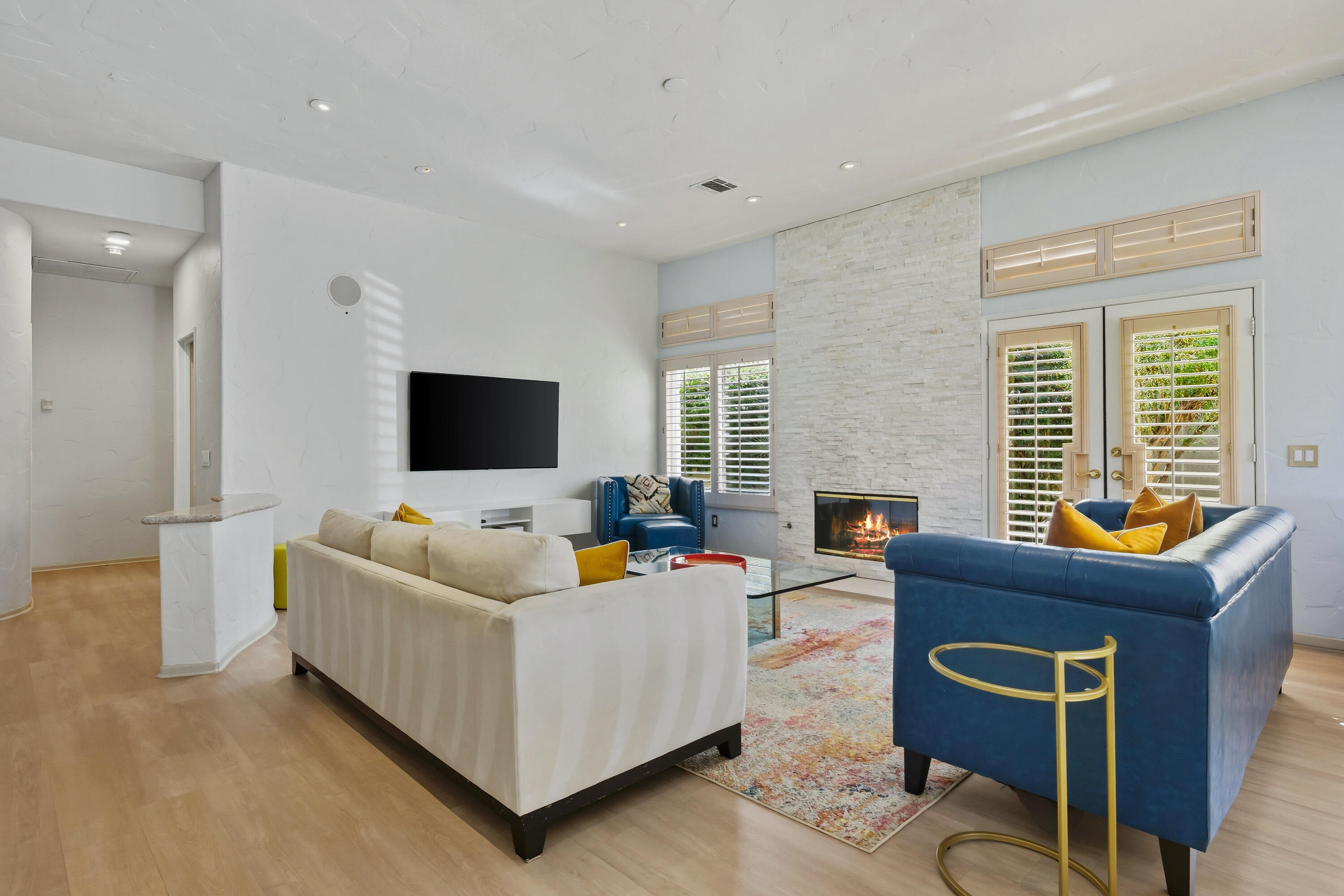 15 Florentina Drive Rancho Mirage, CA 92270 - Photo 8 of 34 a living room with furniture and a flat screen tv