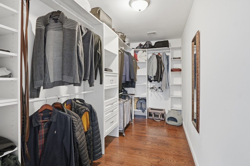 112 Pineland Avenue Worcester, MA 01604 - Photo 17 of 38 a view of walk in closet with clothes and shoes