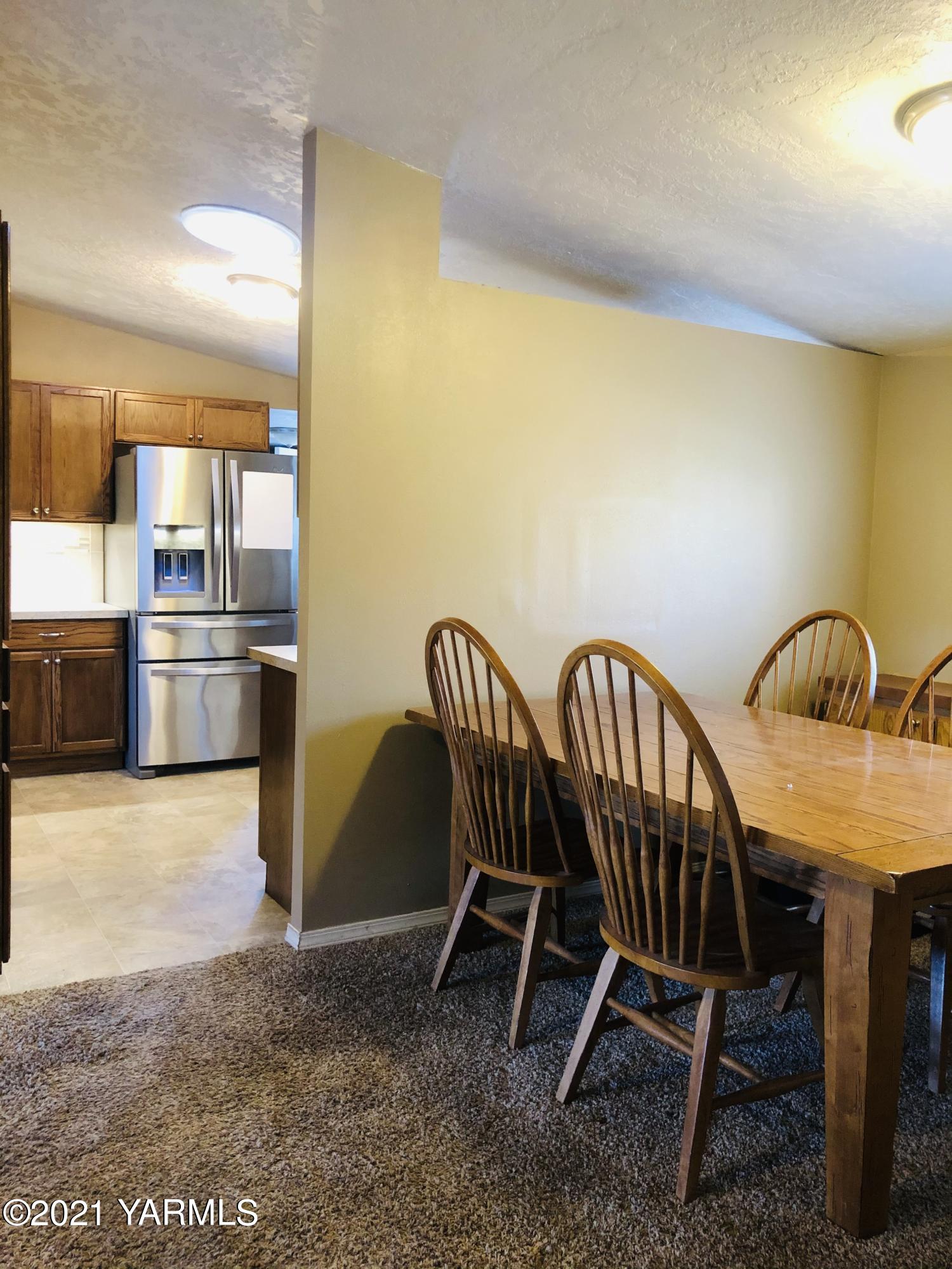 13807 Knox Road Yakima, WA 98908 - Photo 22 of 30 a view of a dining room with furniture