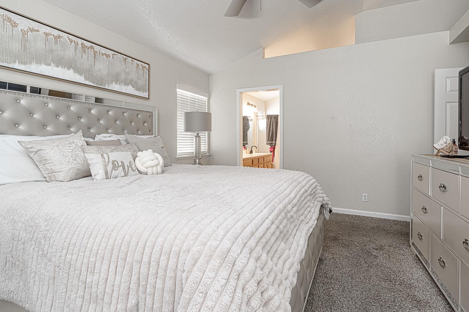 628 Mission Ridge Drive Manteca, CA 95337 - Photo 22 of 27 a bedroom with a bed and a window