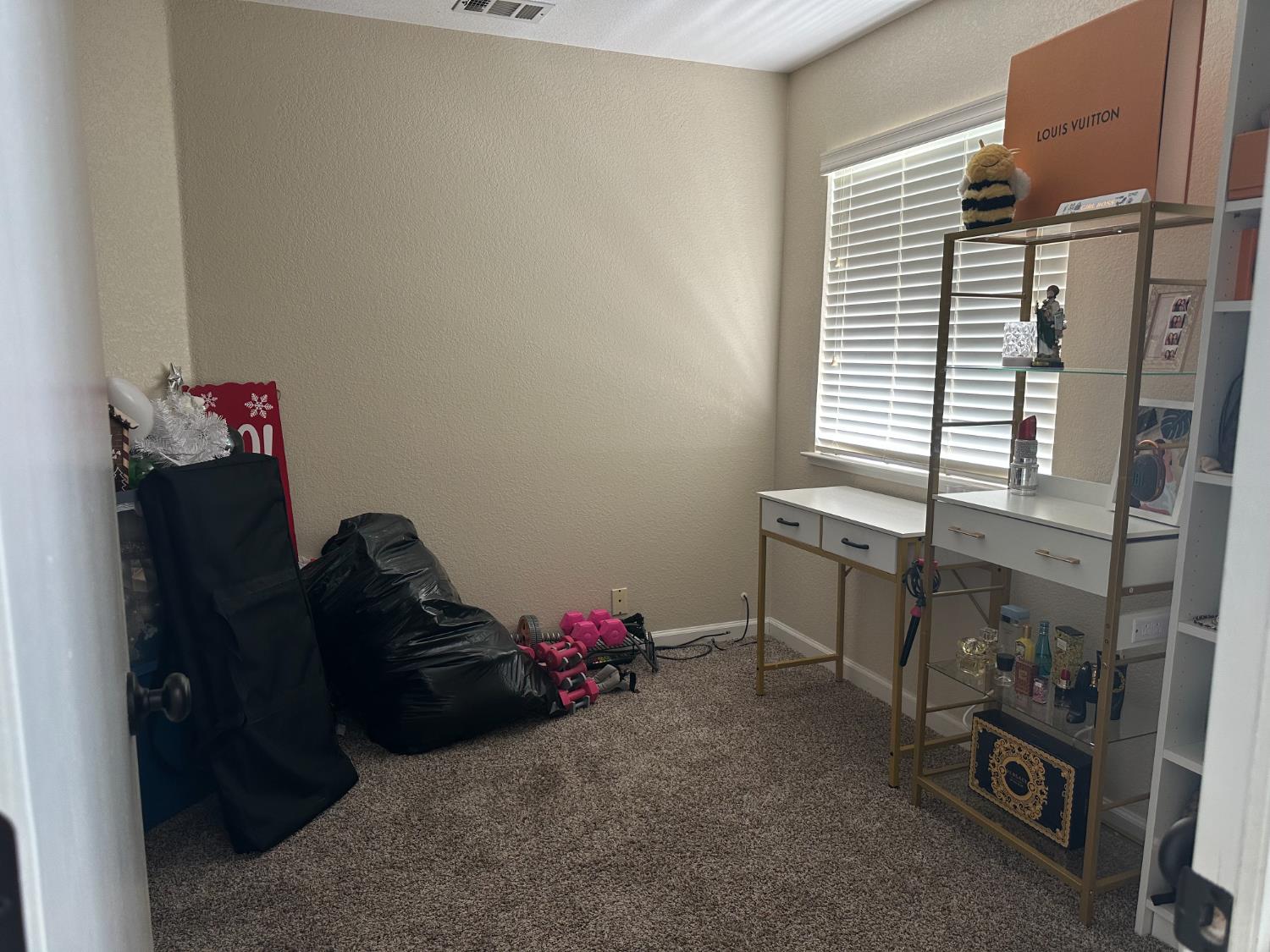 628 Mission Ridge Drive Manteca, CA 95337 - Photo 23 of 27 a bedroom with a bed and a window