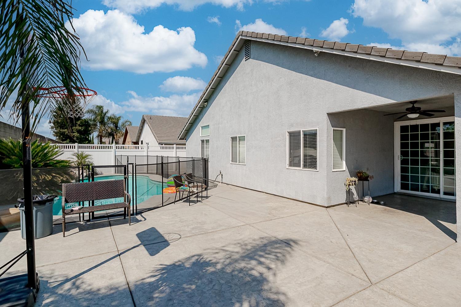628 Mission Ridge Drive Manteca, CA 95337 - Photo 24 of 27 a view of a house with a patio