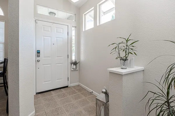 a view of a bathroom with a sink and mirror