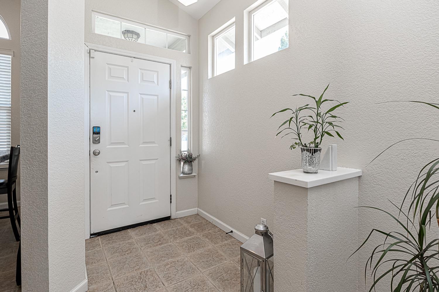 628 Mission Ridge Drive Manteca, CA 95337 - Photo 6 of 27 a view of a bathroom with a sink and mirror