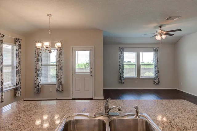 a view of a livingroom with furniture