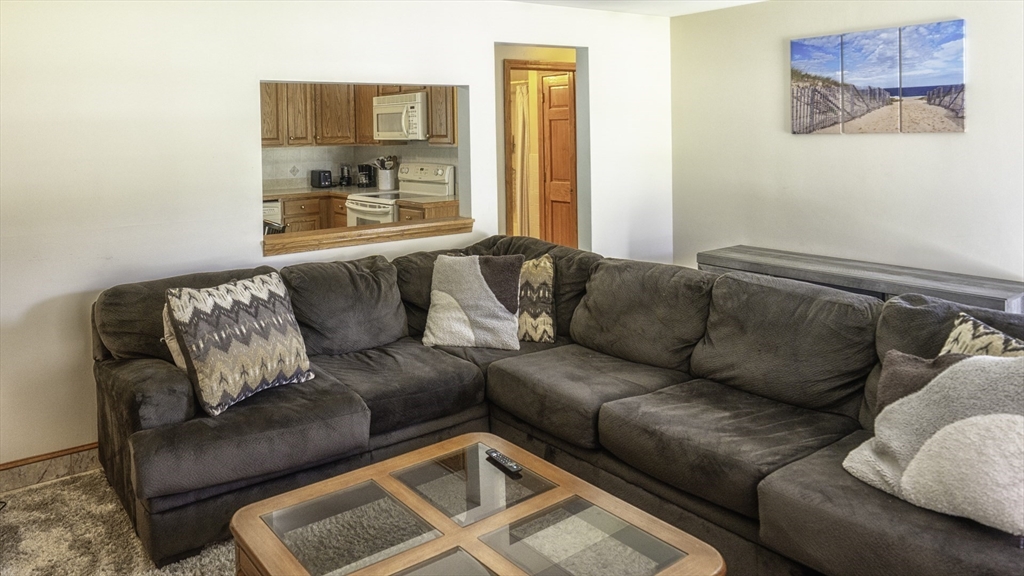 118 Walton Avenue Barnstable, MA 02601 - Photo 3 of 16 a living room with furniture and a couch