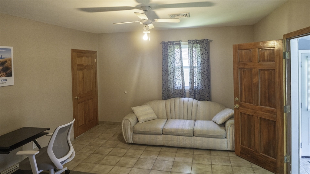118 Walton Avenue Barnstable, MA 02601 - Photo 5 of 16 a living room with furniture and a window