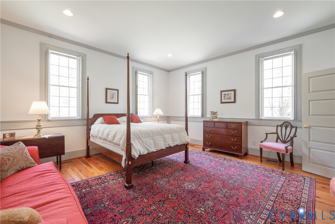 6353 Godwin Boulevard Suffolk, VA 23432 - Photo 16 of 50 Primary Bedroom has four handsome windows, each wi