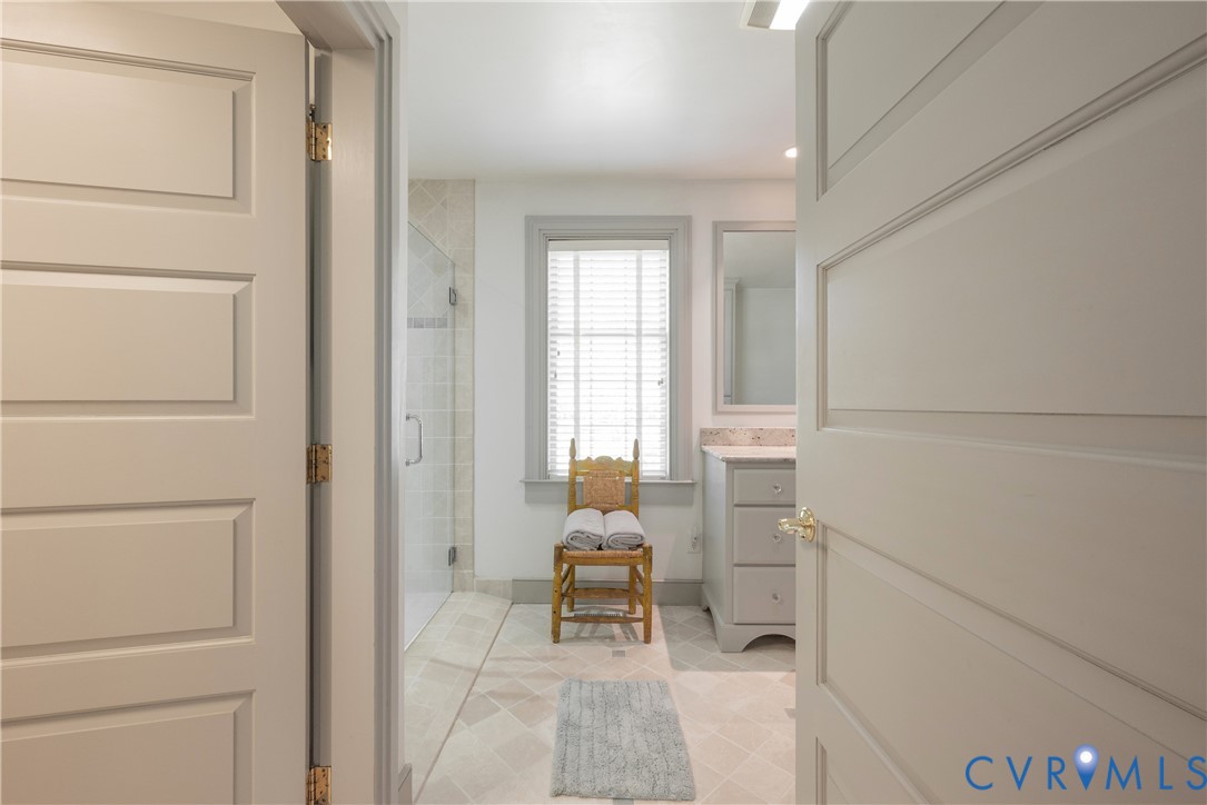 6353 Godwin Boulevard Suffolk, VA 23432 - Photo 17 of 50 With an earthy "tumbled limestone" ceramic floor,
