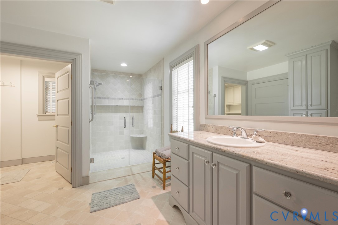 6353 Godwin Boulevard Suffolk, VA 23432 - Photo 19 of 50 Extensive stone vanity with porcelain sink has amp