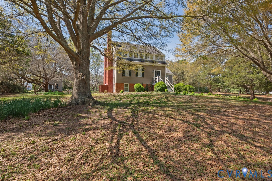 6353 Godwin Boulevard Suffolk, VA 23432 - Photo 2 of 50 Gracious live oaks enhance the property.