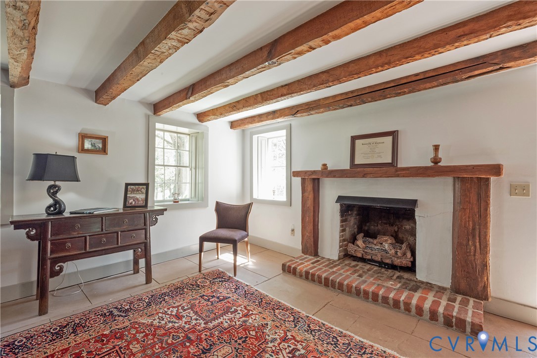 6353 Godwin Boulevard Suffolk, VA 23432 - Photo 29 of 50 With a raised brick hearth, the fireplace has an u