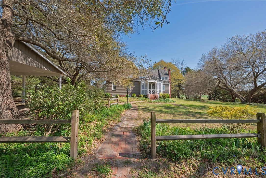 6353 Godwin Boulevard Suffolk, VA 23432 - Photo 45 of 50 A simple horse fence leads to the Rear Entrance Sc