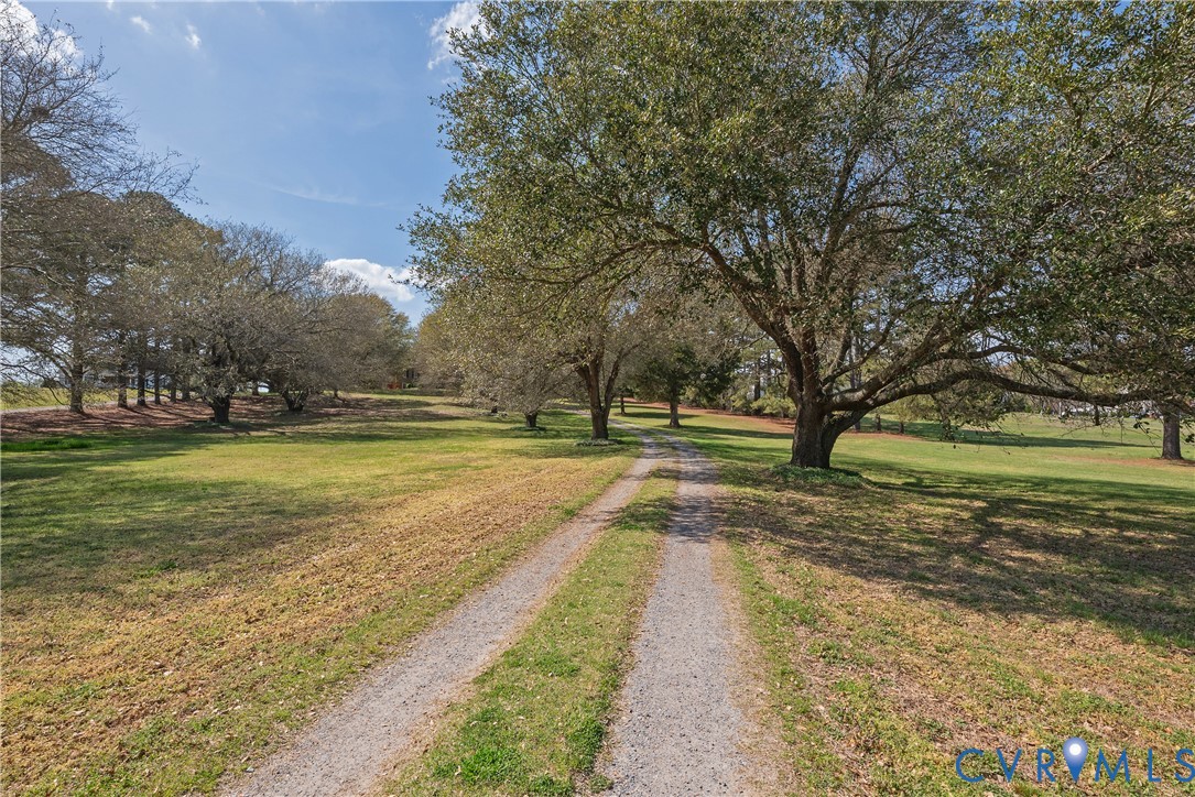 6353 Godwin Boulevard Suffolk, VA 23432 - Photo 47 of 50 The approach to Phillips Farm is a gently meanderi