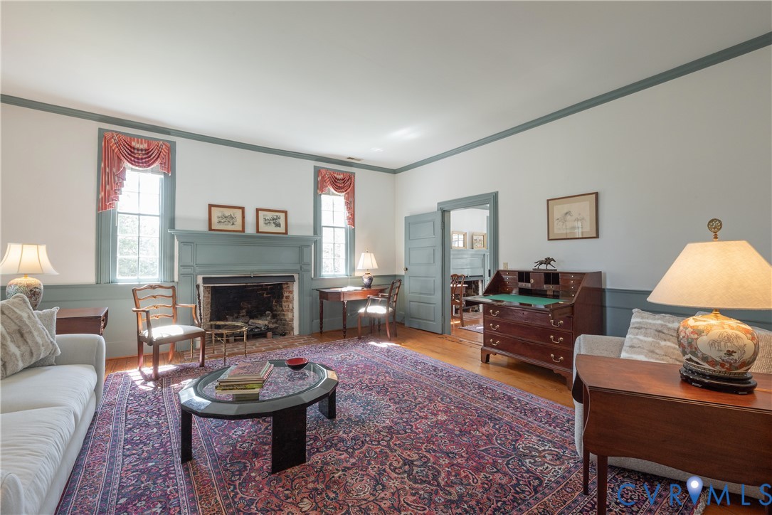 6353 Godwin Boulevard Suffolk, VA 23432 - Photo 5 of 50 The formal Living Room has four deep windows with
