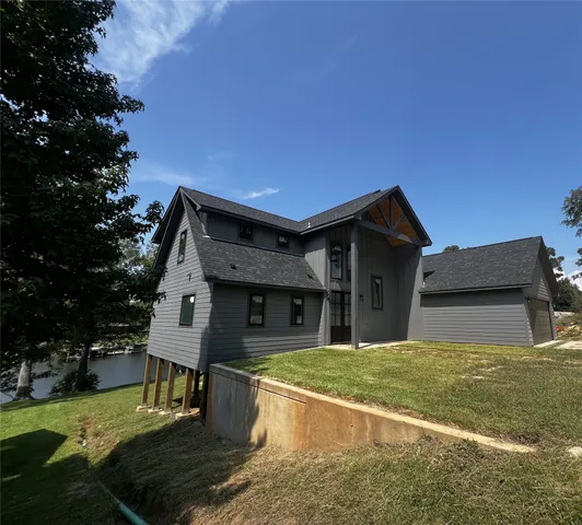 a house view with a garden space