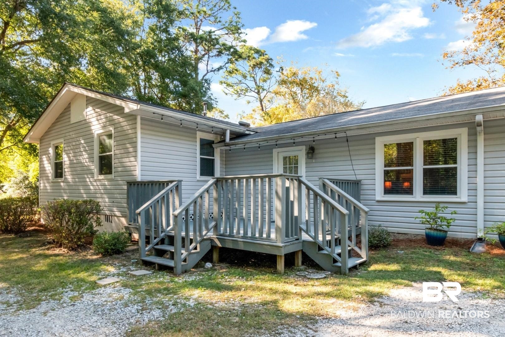 1321 Rainbow Drive West Mobile, AL 36693 - Photo 45 of 48 Rear view of house featuring a deck