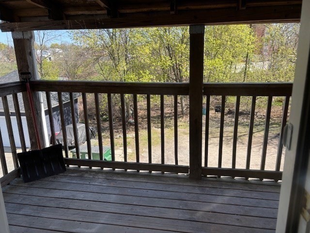 21 North Warren Street, Unit 2 Woburn, MA 01801 - Photo 10 of 12 a view of a porch with wooden floor