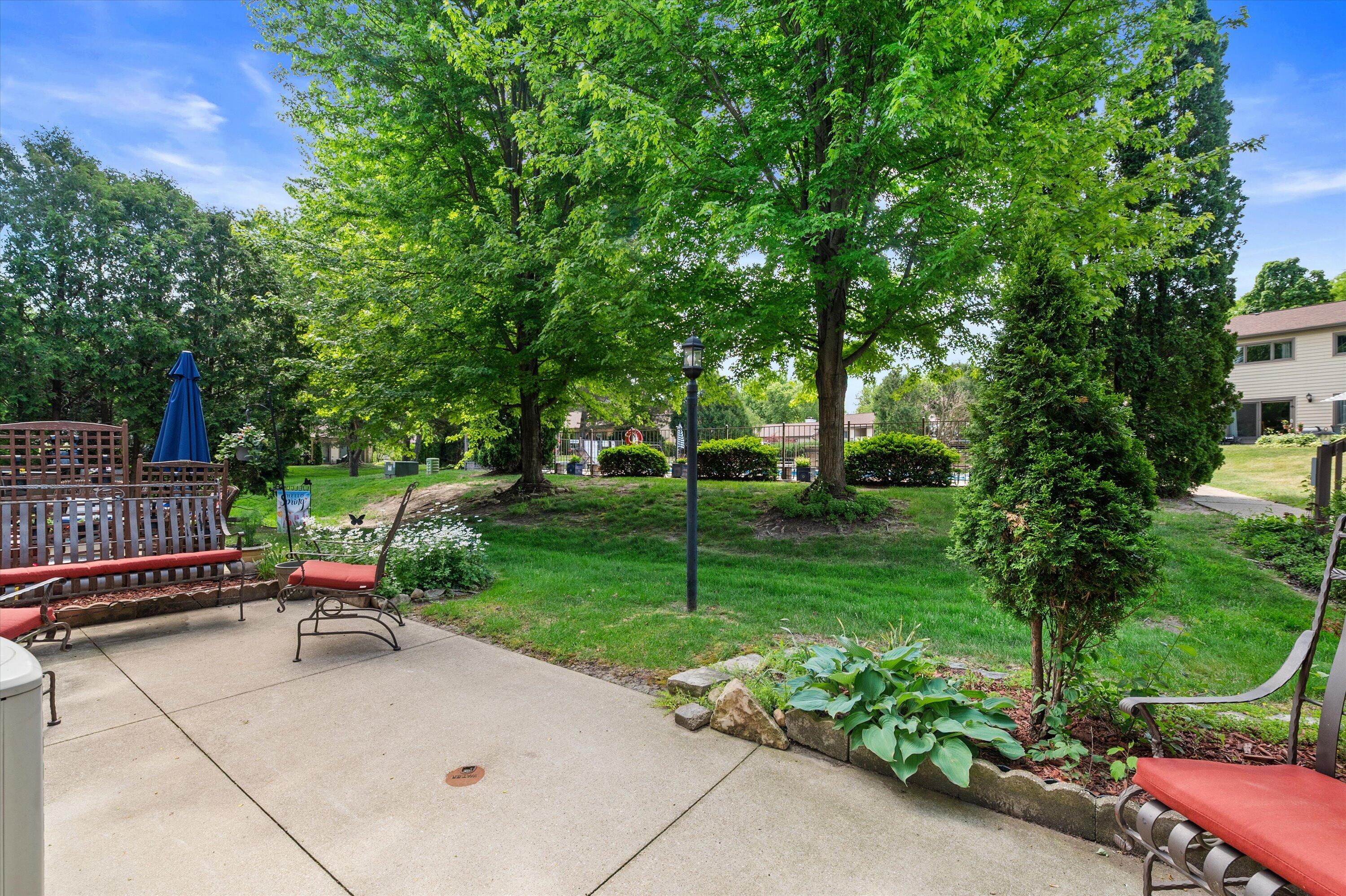 972 Valentine Road Oconomowoc, WI 53066 - Photo 3 of 34 Patio overlooking the pool
