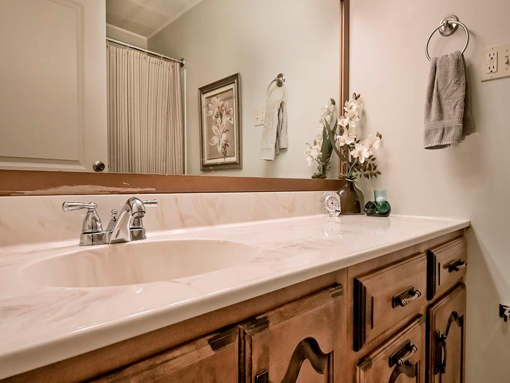2501 Braddock Drive Lower Burrell, PA 15068 - Photo 11 of 22 a bathroom with a sink and a mirror