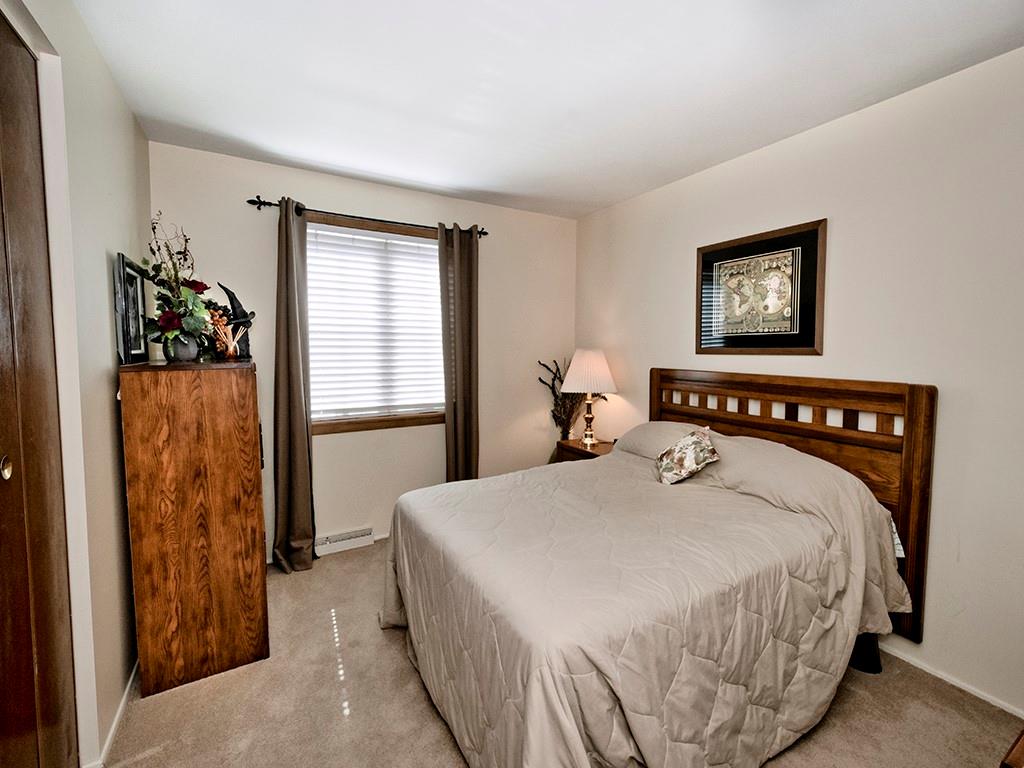 2501 Braddock Drive Lower Burrell, PA 15068 - Photo 12 of 22 a bedroom with a bed and a window