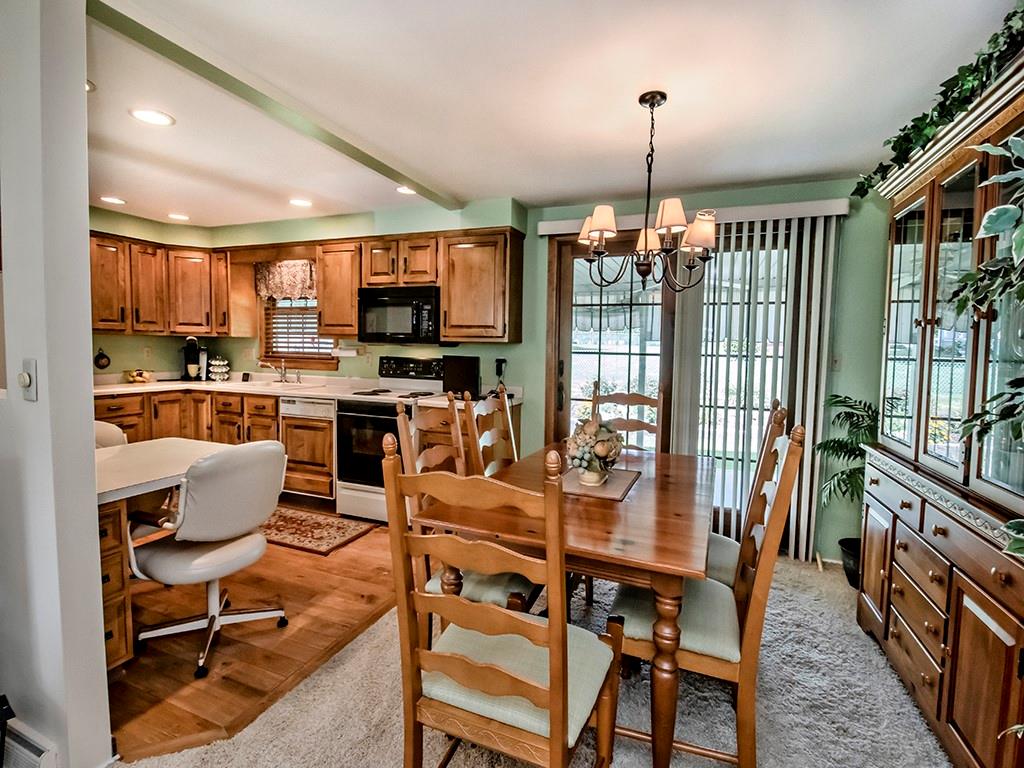 2501 Braddock Drive Lower Burrell, PA 15068 - Photo 4 of 22 a view of a dining room with furniture window and outside view