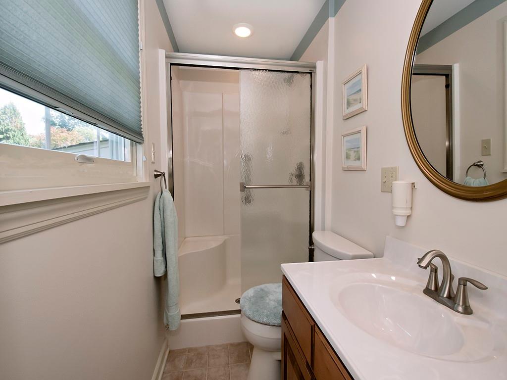2501 Braddock Drive Lower Burrell, PA 15068 - Photo 6 of 22 a bathroom with a sink toilet and shower
