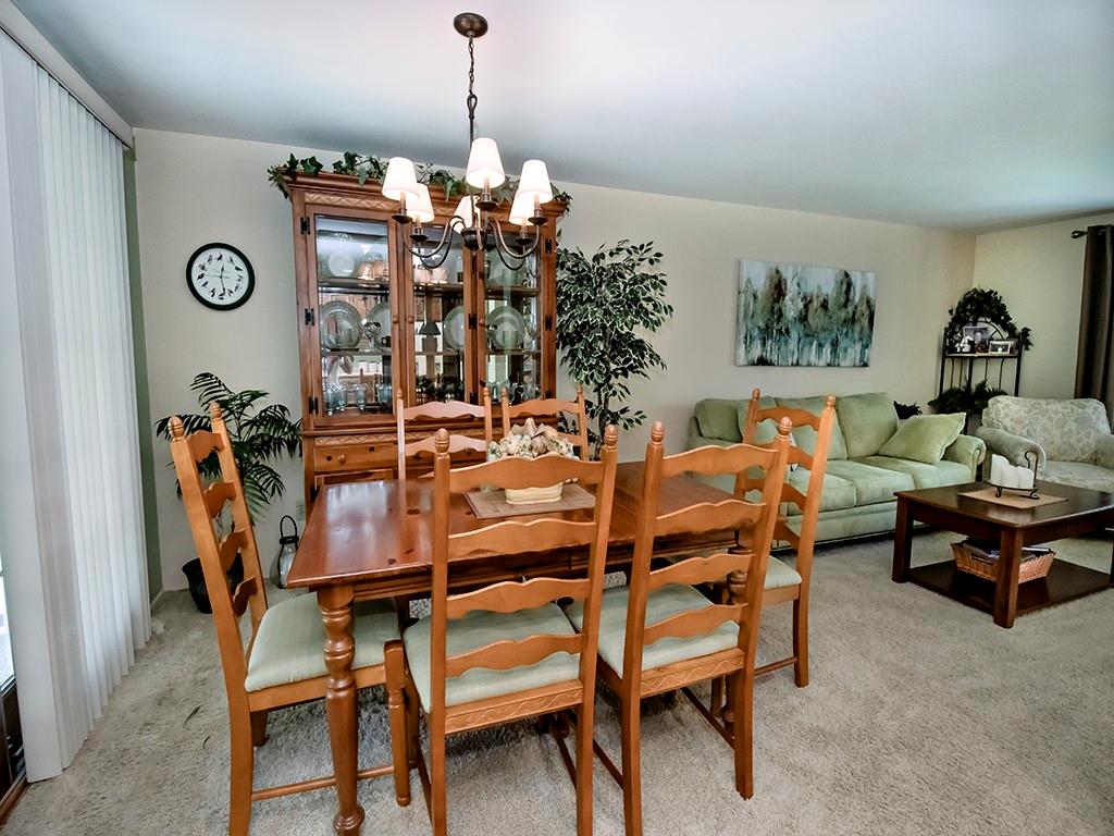 2501 Braddock Drive Lower Burrell, PA 15068 - Photo 7 of 22 a view of a dining room with furniture and chandelier