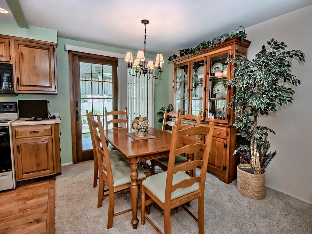 2501 Braddock Drive Lower Burrell, PA 15068 - Photo 8 of 22 a dining room with furniture window and wooden floor