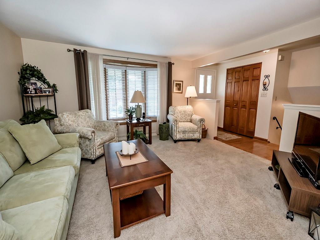 2501 Braddock Drive Lower Burrell, PA 15068 - Photo 9 of 22 a living room with furniture and a flat screen tv