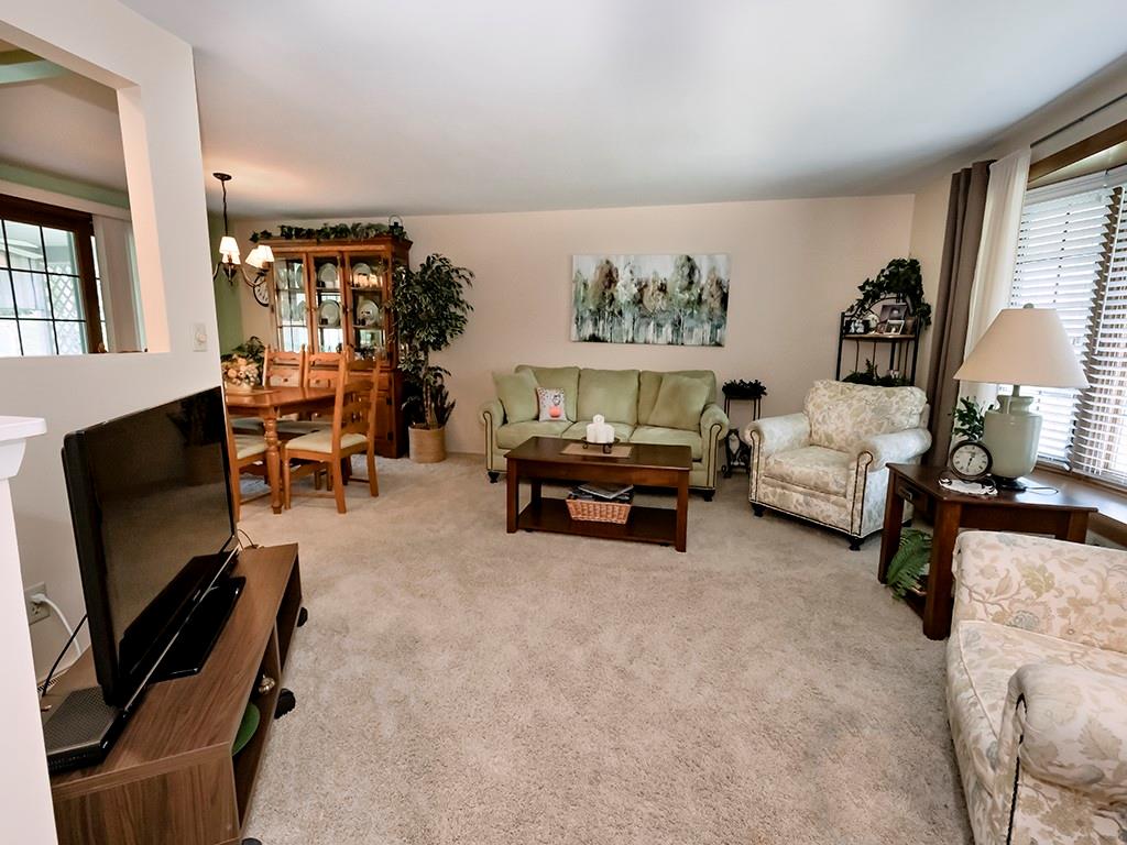 2501 Braddock Drive Lower Burrell, PA 15068 - Photo 10 of 22 a living room with furniture and a flat screen tv