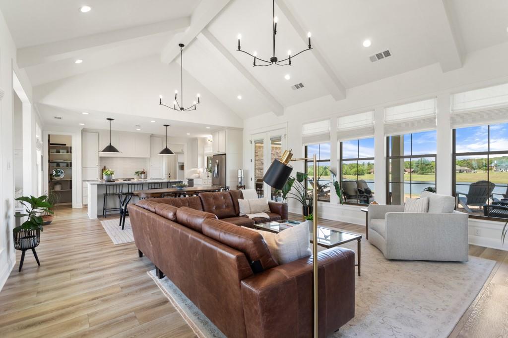 23630 Champion Drive Lindale, TX 75771 - Photo 5 of 36 a living room with furniture kitchen view and a large window