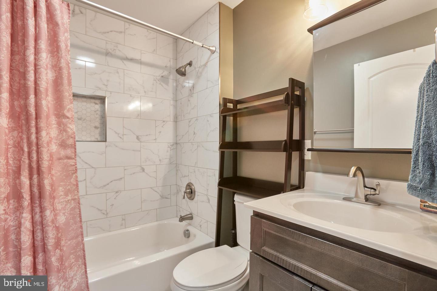 1007 Venice Drive Silver Spring, MD 20904 - Photo 22 of 39 a bathroom with a sink toilet and shower