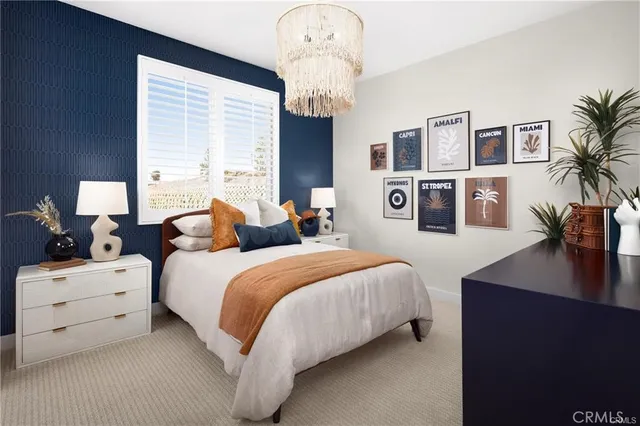 a bedroom with bed and window