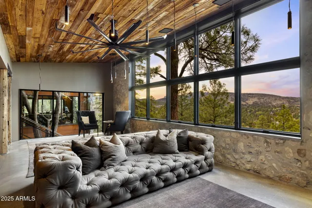 a living room with a couch and a table