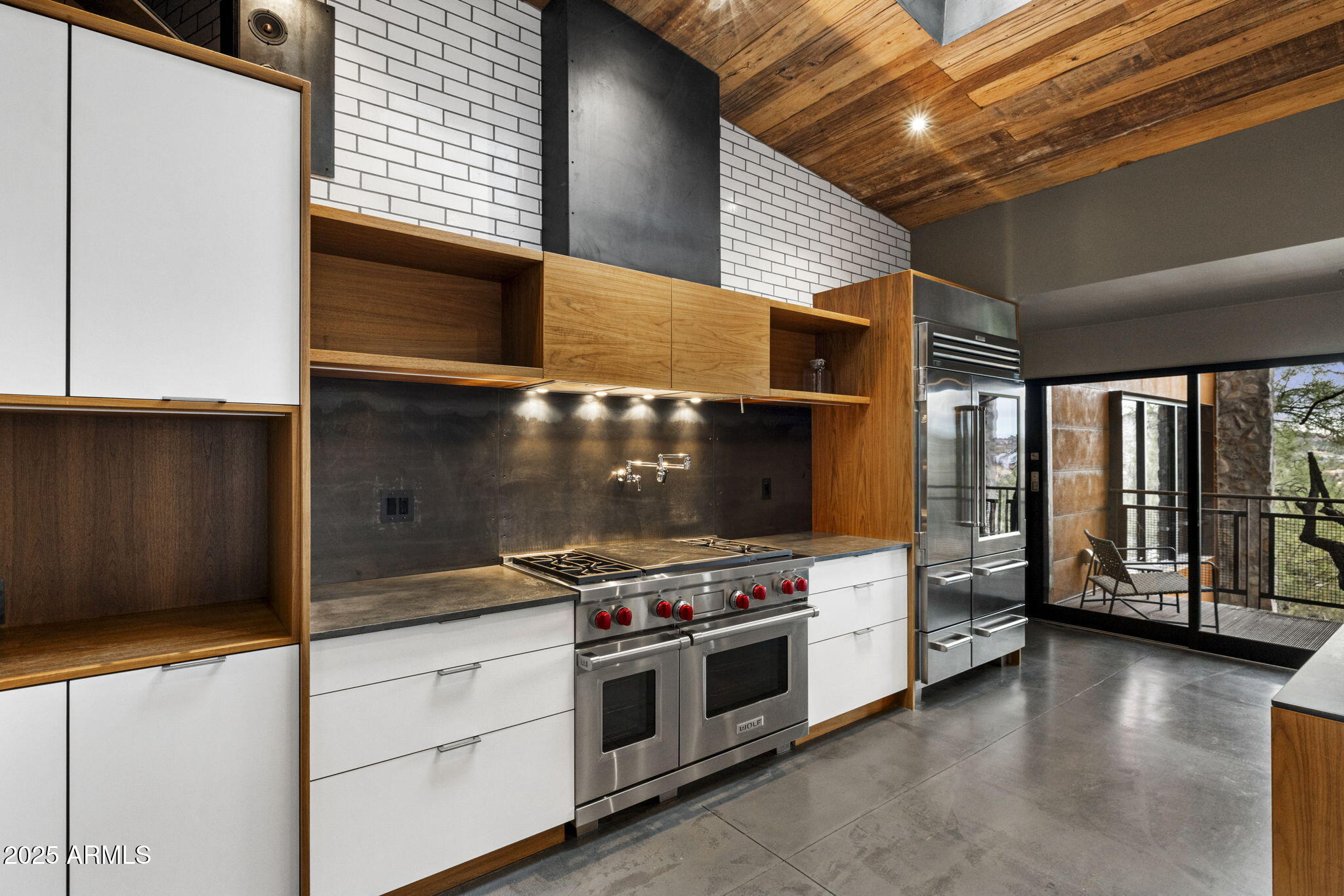 51 Rill Road Prescott, AZ 86305 - Photo 28 of 89 a kitchen with stainless steel appliances a stove and a microwave