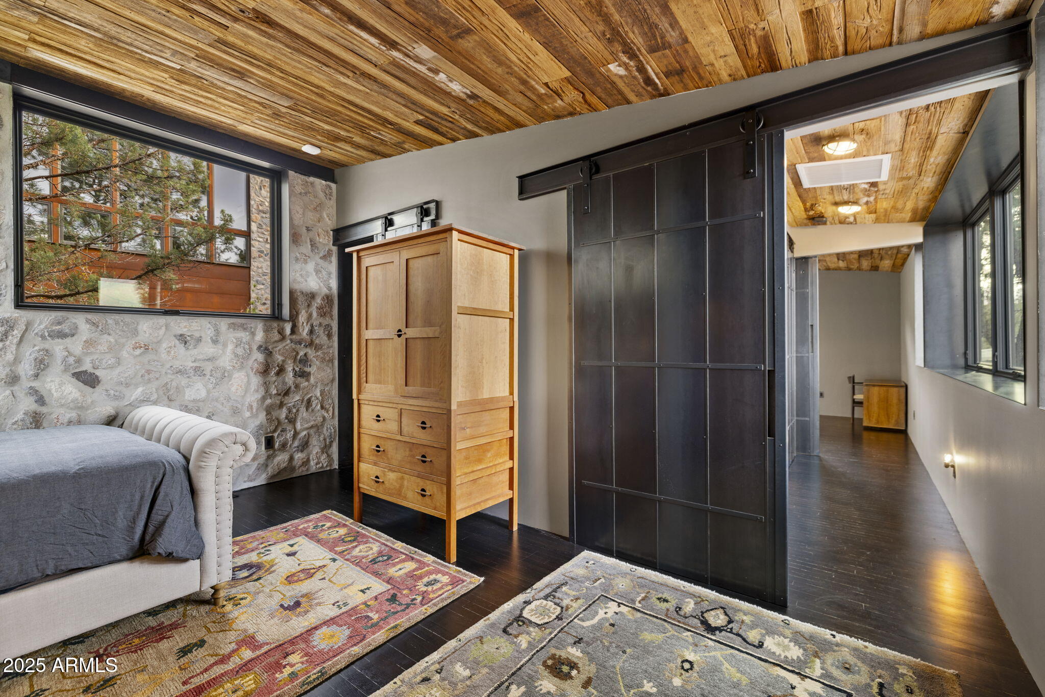 51 Rill Road Prescott, AZ 86305 - Photo 57 of 89 a bedroom with a bed and wooden floor